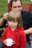 Girl (3-4 years) with milk moustache, Lake Ammersee, Bavaria, Germany