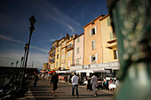 People walking along the Promenade, St. Tropez, Cote d'Azur, Provence, France
