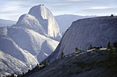 Half Dome taken from Olmstead Point. Granite. Exfoliation of dome sculpted by glacier movement. Olmstead Point on Tioga Rd. near Tuolumne Meadows. Yosemite National Park. California, USA