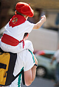 Young boy in Basque costume at the Festival of San Fermin Pamplona Navarre Spain