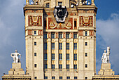 Stalin-era building of Moscow state university with statues, Moscow, Russia