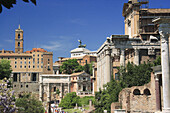View of Forum Romanum from west to east: arch of Septimius Severus (203), church S. Lorenzo in Miranda (1601-1614), church S. Giuseppe dei Falegnami (1597-1663), Rome. Lazio, Italy