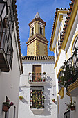 St. Francis church and typical street, Estepona. Málaga province, Costa del Sol. Andalusia, Spain