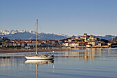 San Vicente de la Barquera and Picos de Europa panoramic view from Playa del Tostadero. Cantabria. Spain.