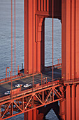 Detail of the bridge deck and tower of the Golden Gate Bridge, San Francisco, California, United States of America