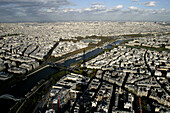 The aerial view of city of Paris with the shadow of Eiffel Tower in foreground, Paris, France