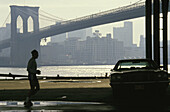 Man running. Brooklyn Bridge. New York City. USA