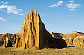 Temples of the Sun and Moon illuminated by early morning sun in Capitol Reef National Park, Utah, USA.