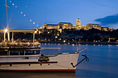 Royal Palace and restaurant ship on the Danube river. Budapest. Hungary 2006