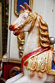 Aged, Amusement, Amusements, Carousel, Carousels, Childhood, Close up, Close-up, Closeup, Color, Colour, Fantasy, Fun, Head, Heads, Horse, Horses, Infantile, Leisure, Merry go round, Merry-go-round, Old, Old fashioned, Old-fashioned, One, Recreation, Wood