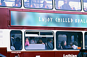 Side of a bus with young girl leaning out the window. Edinburgh. Scotland. UK.