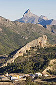 Beniardá town, Bernia peak in background. Alicante province, Spain