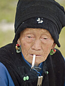 old Bai woman smoking, Dali, China