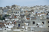 Antennas covering the roofs of the Andalusi quarter seen from Karaouiyine quarter, medina of Fes. Morocco (May, 2006)