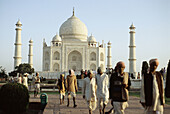 Workers leaving the Taj Mahal in early morning, Agra. Uttar Pradesh, India (October, 2005)