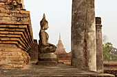Thailand, SUCHOTHAI, WAT MAHATHAT, Buddha statue.