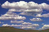 Clouds over the open grasslands of Mongolia. Gobi Gurvansaikhan National Park