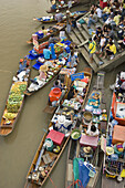 Floating Market southwest of Bangkok. Amphawa Floating Market. Vegetable vendors meet on canal in the afternoon every friday suterday and sunday