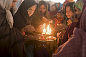 The Aarthi is the ceremonial marking the end of a Puja by the rotation of a flame as an offering to god. This is shot inside the Nirvani Akhara during the Ardh Kumbh Mela 2007.