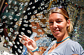 Mid adult woman near mirror with Swarowski crystals, Vienna, Austria