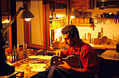 Europe, Germany, Saxony, Vogtland, Markneukirchen, Violin maker at his factory