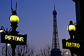 Subway entrance and Eiffel Tower. Paris. France