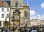 Crowd of tourists watching Astronomical Clock at Old Town Square in Prague, Czech Republic