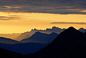 backdrop scenery of Dolomites at sunrise from hut Flaggerschartenhütte, Marburg-Siegener Hütte, Rifugio Forcella di Vallaga, Sarntal range, South Tyrol, Alta Badia, Italy