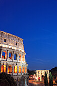 Colosseum in the evening, Arch of Constantine in backgorund, Rome, Italy