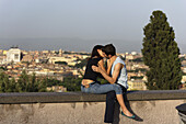 Young couple kissing  on Janiculum Hill, Rome, Italy