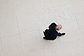 Man is walking through the british museum in London, England