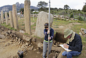 Working on the archeological site of  Stantari, at Cauria. Corsica. France