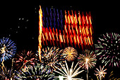 Firework display with United States flag