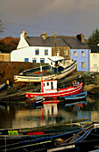Europe, Great Britain, Ireland, Co. Galway, Connemara, fishing village of Roundstone, fishing boats at the pier