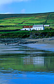 View at beach and cottages at St. Finan's Bay, County Kerry, Ireland, Europe