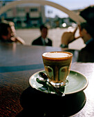 A glass of coffee on a table, Mojo Café, Wellington, North Island, New Zealand