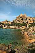 Italy Sardinia Capo Testa Cala Spinosa, sand beach with cristal clear water surrounded by bizarre rocks