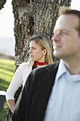 Mid adult couple near a tree