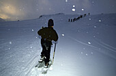 Snow shoe walking, ski resort of Motta Naluns, Scuol, Lower Engadine, Engadine, Grisons, Switzerland