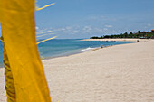 Sandy beach Nusa Dua on the peninsula Bukit Badung at the southern tip of Bali, Indonesia