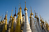 Golden stupas of the pagode in Indei at the Inle Lake, Shan State, Myanmar, Burma