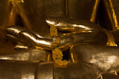 Hands of a golden Buddha Statue in Bagan, Myanmar, Burma