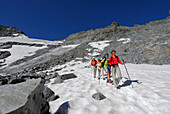 group of hikers descending from Pitztaler Jöchl, Ötztal range, Tyrol, Austria