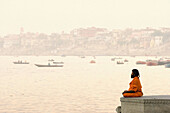 Praying by the Ganges, Varanasi. Uttar Pradesh, India