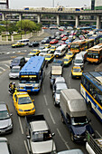 Noon Traffic at Victory Monument, Bangkok. Thailand