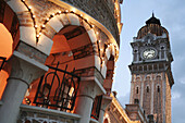 Staircase and clock tower of Sultan Abdul Samad Building (build 1897) in dawn, Kuala Lumpur, Malaysia, Asia