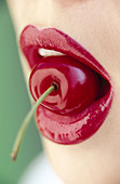 Adult, Adults, Bite, Bites, Biting, Cherries, Cherry, Close up, Close-up, Closeup, Color, Colour, Concept, Concepts, Contemporary, Detail, Details, Eat, Eating, Female, Food, Fruit, Fruits, Girl, Girls, Human, Lip gloss, Lip-gloss, Lips, Mouth, Mouths, No