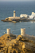 OMAN-Sharqiya Region-Sur: Towers of Al Ayajh Fort / Sur Bay / Late Afternoon