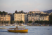Waterbus and cityscape of Geneva, Mont Blanc in the Background, Canton of Geneva, Switzerland