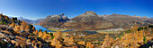 Panorama with larches in autumn colours and Piz da la Margna, lake Silser See, lake Silvaplaner See, Piz Lagrev, lake Champfer See, Piz Julier and Piz Nair, Oberengadin, Engadin, Grisons, Switzerland